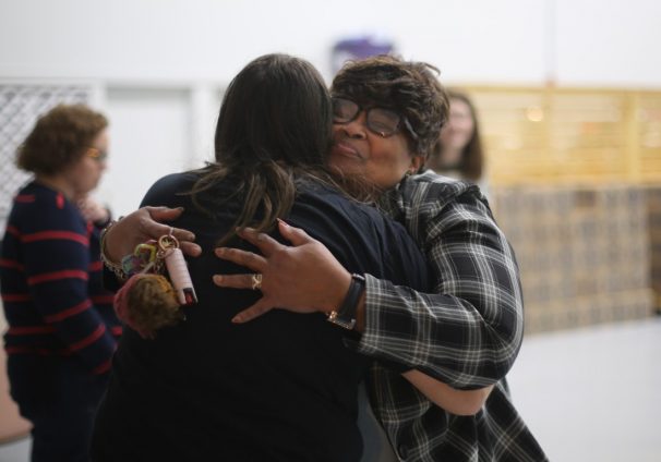 Kay Bennett receives a hug