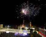 Palestinian Christians celebrate the lighting of a Christmas tree