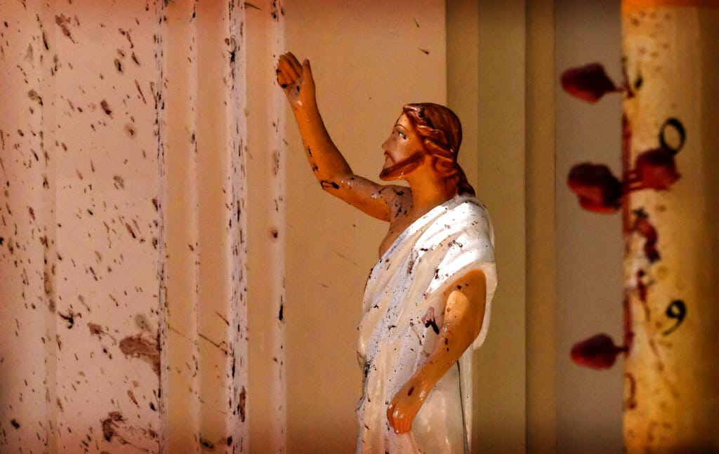 Blood stains a Jesus Christ statue