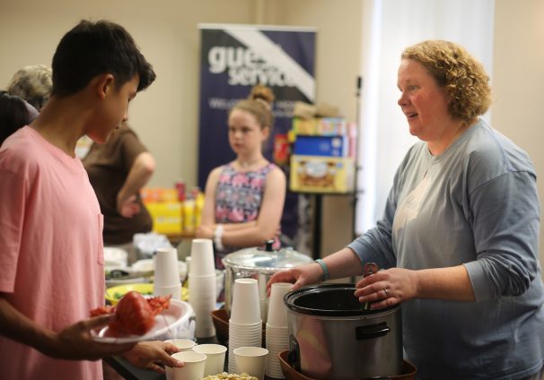 Katie Wood serving lobster