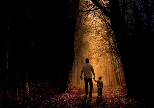 father and son walking