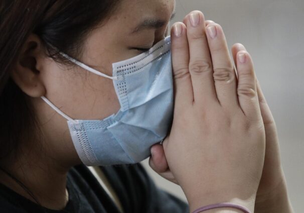 worshipper with mask