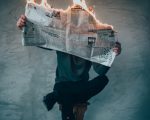 burning newspaper