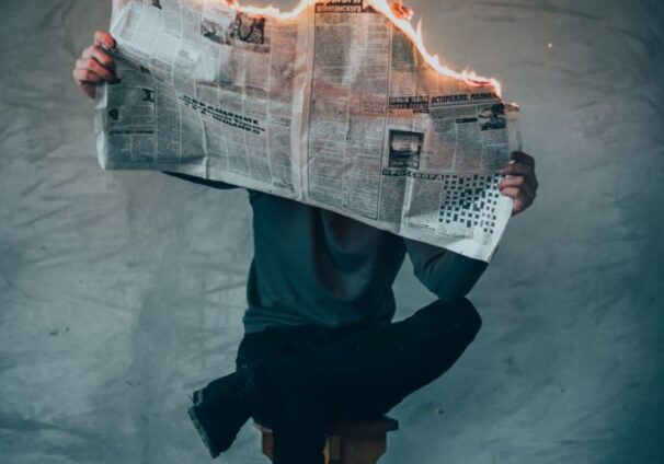 burning newspaper
