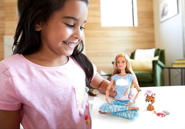 Girl with Barbie doll