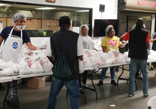 homeless man receiving meal