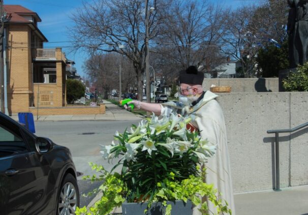 priest with squirt gun