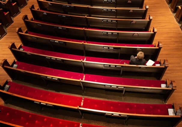 Lone woman in pews