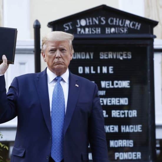 Donald Trump holds a Bible